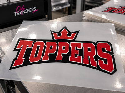 Large DTF transfer of a Toppers team logo on transfer film